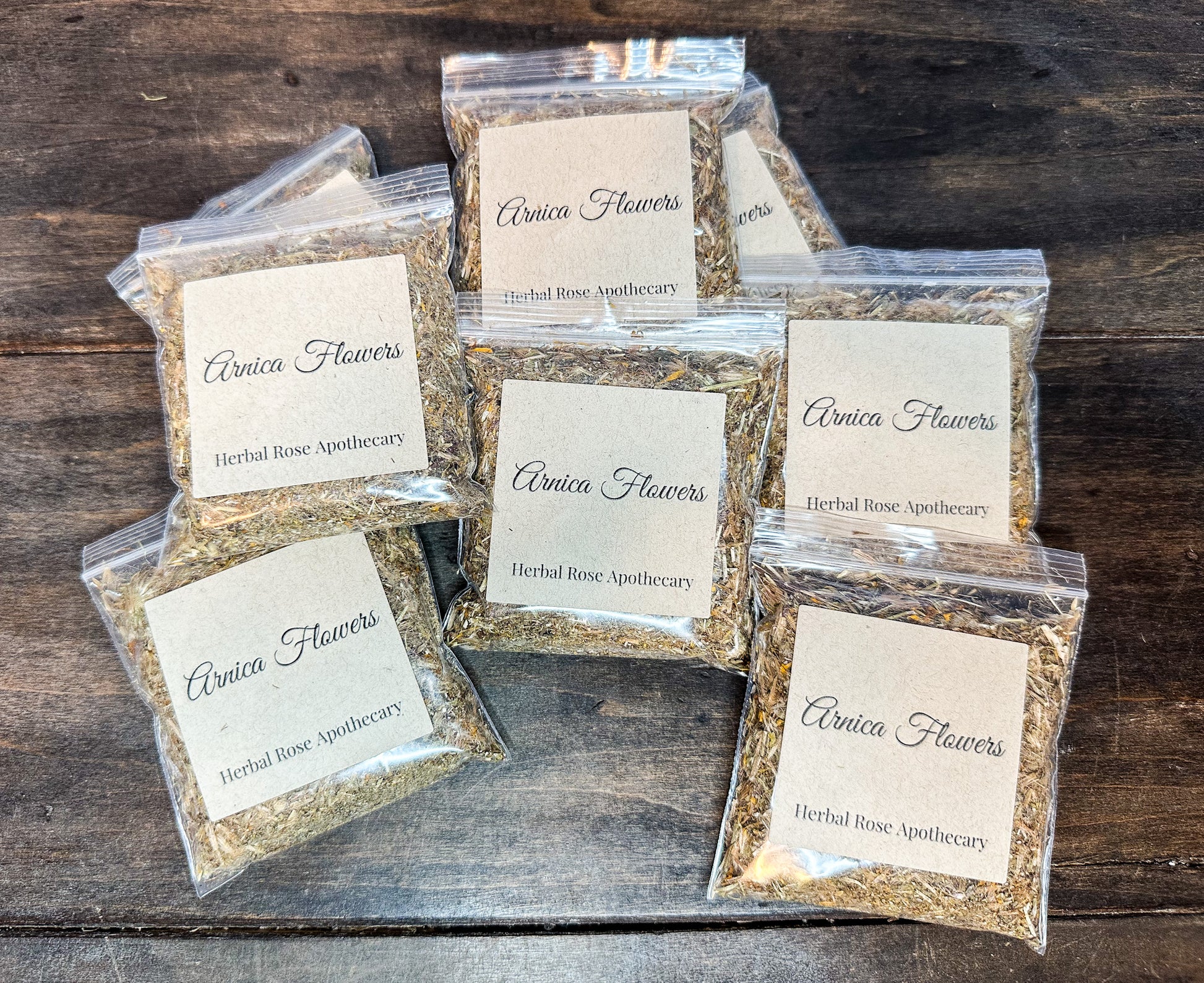 arnica flowers with wood background