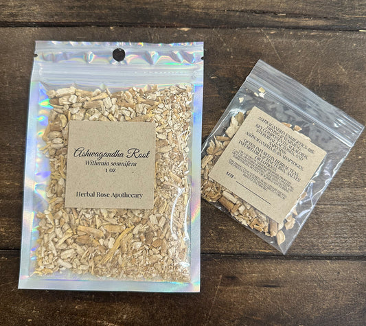 Two packages of Ashwagandha Root from Herbal Rose Apothecary on a wooden surface.