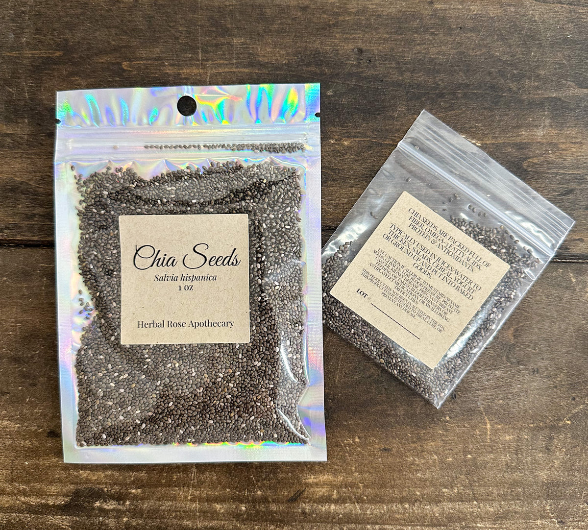 two packages of chia seeds from herbal rose apothecary on a wooden surface