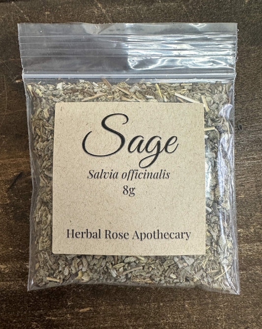 dried sage leaves in 8g clear resealable bag on wooden surface