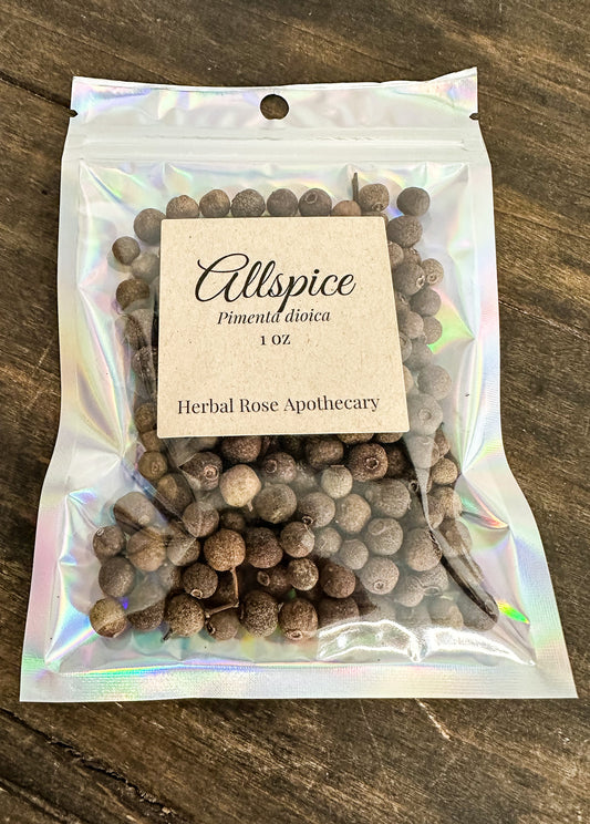 Packaged allspice with a 1oz label on a wooden surface