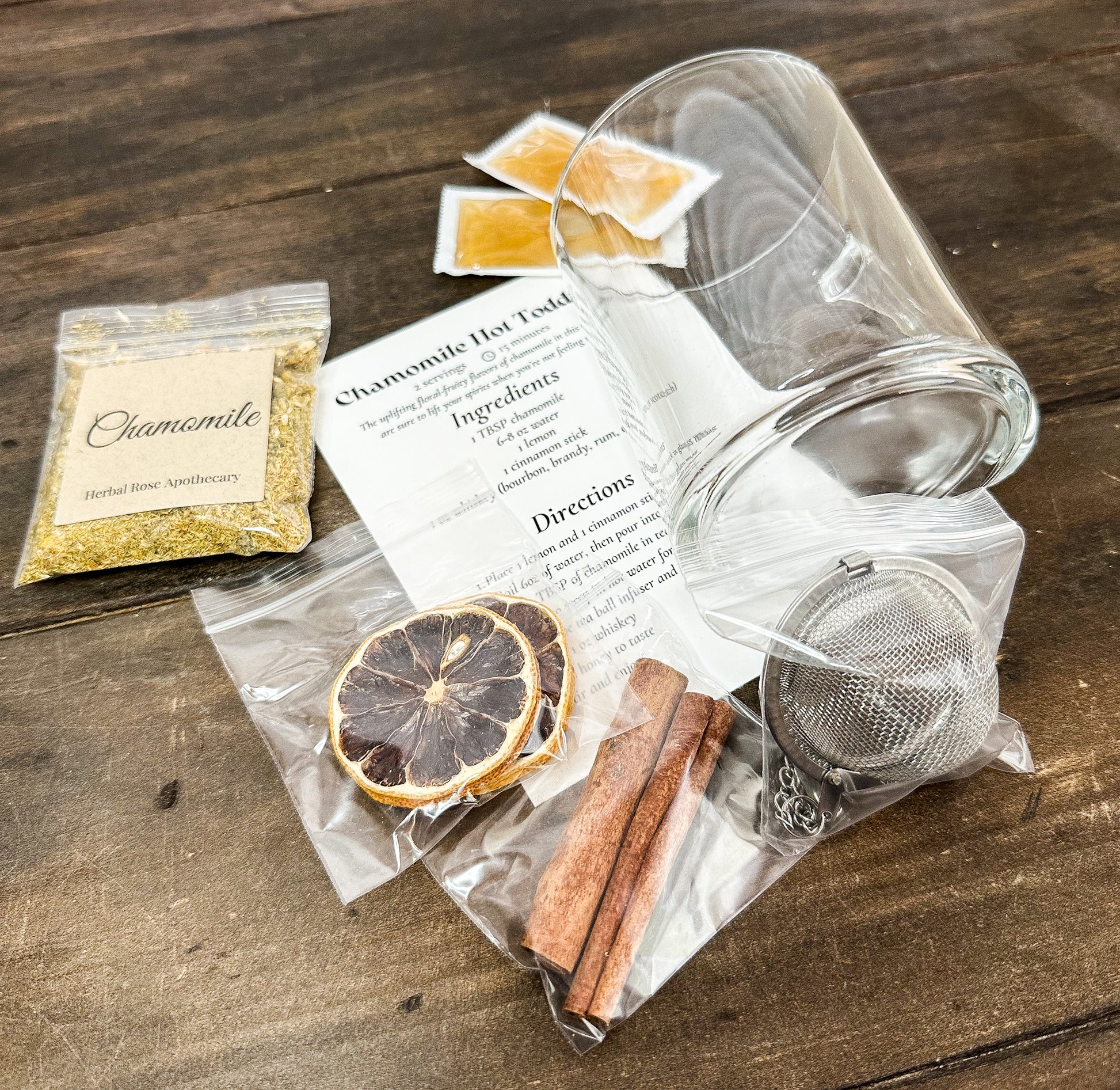 chamomile hot toddy gift set contents inside on wooden table