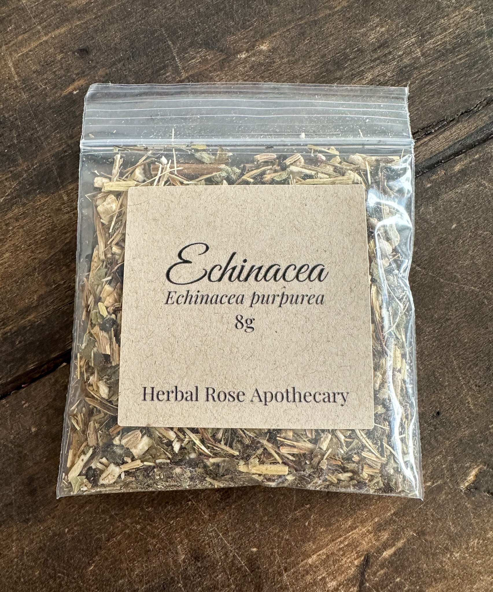 echinacea herb 8g bag on a wooden surface from herbal rose apothecary