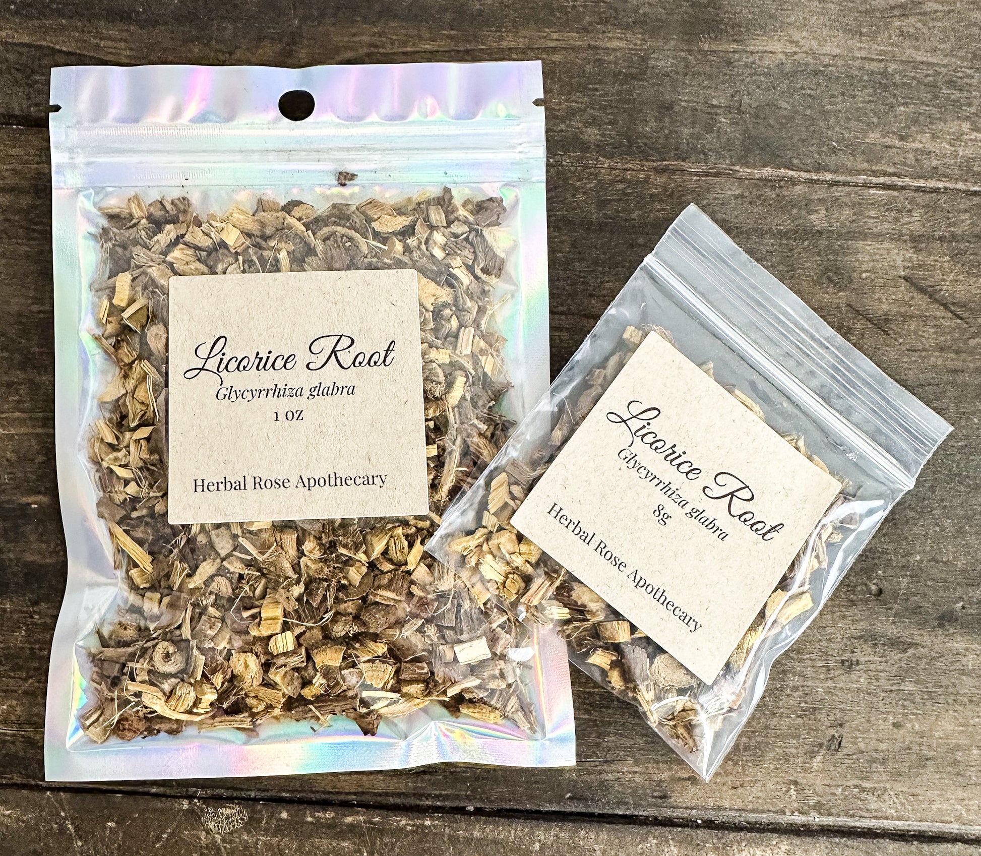 two packaged up dried licorice root bags on wooden surface from herbal rose apothecary