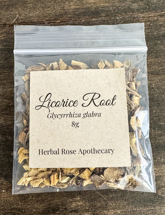 Packaged licorice root with a label on a wooden surface