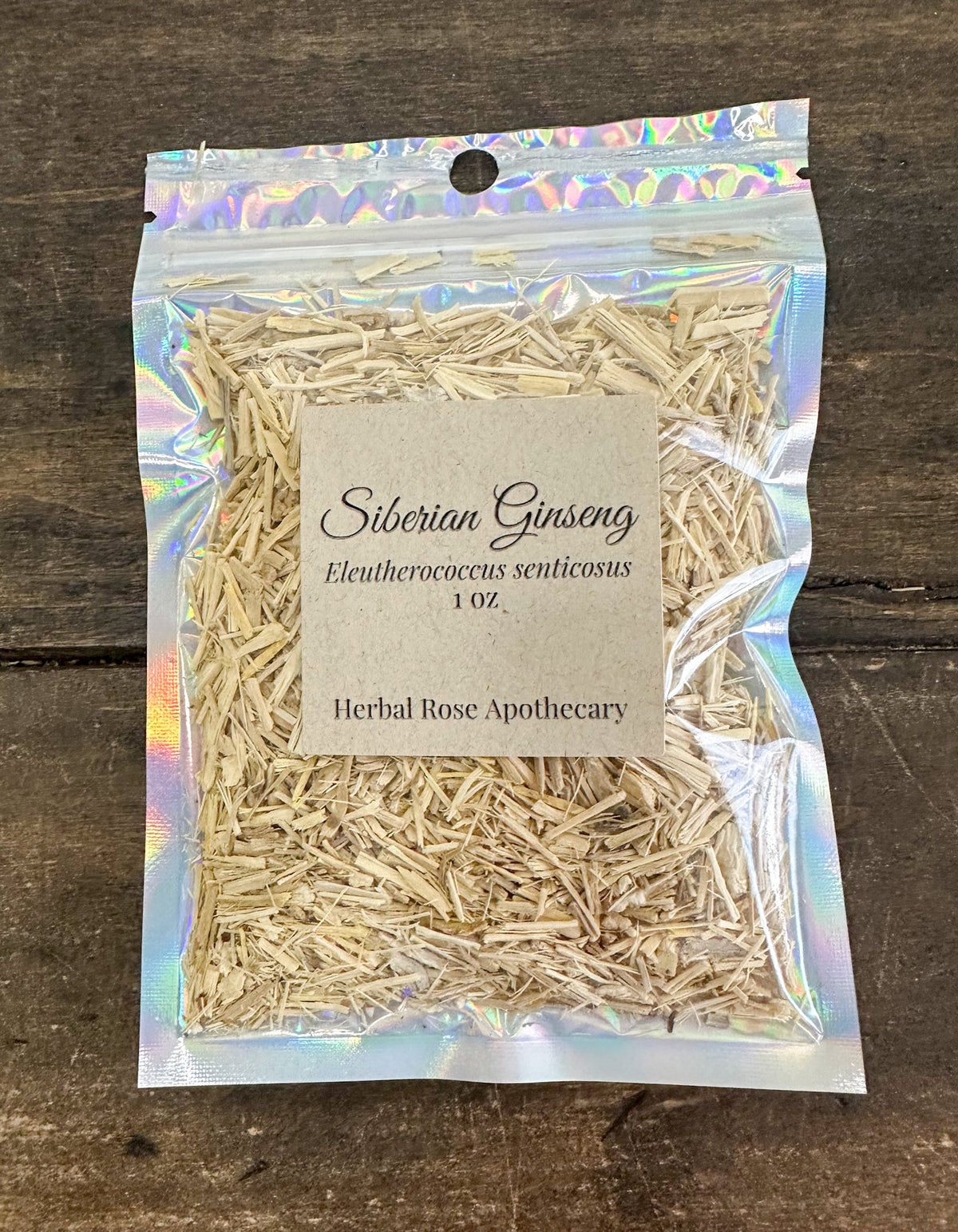 dried siberian ginseng in 1oz holographic bag on wooden surface