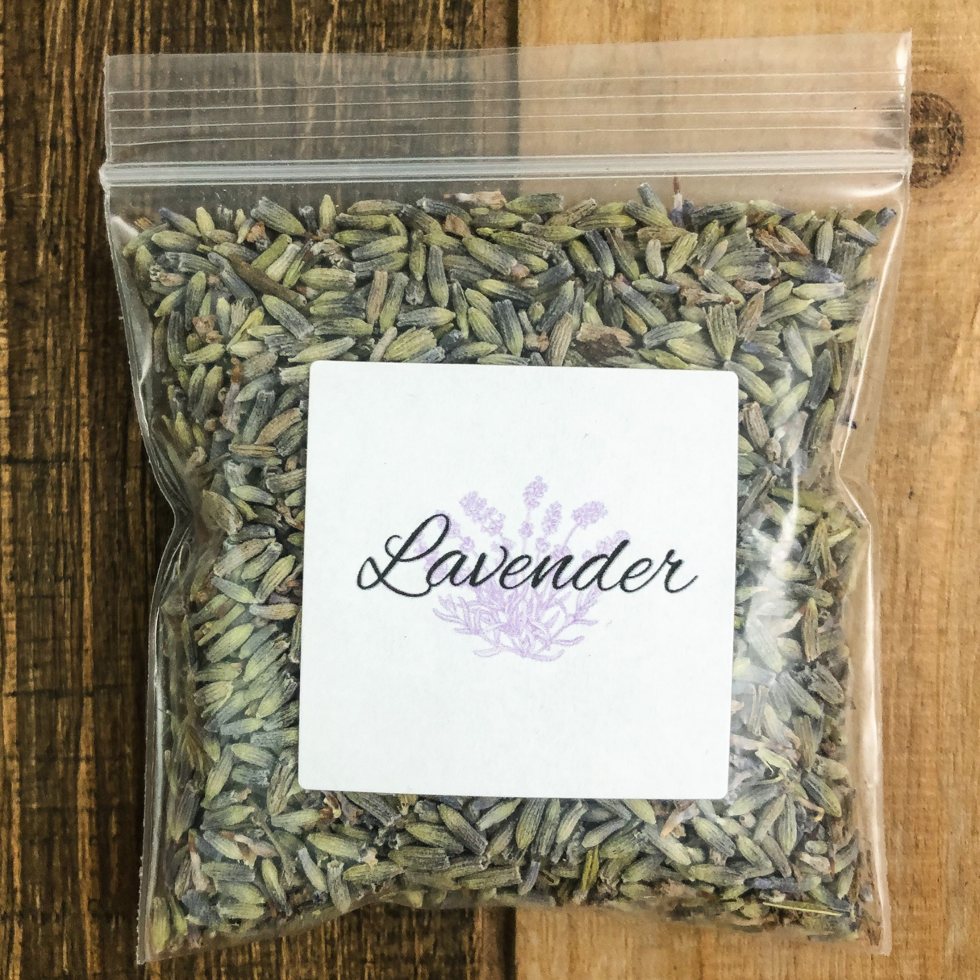 8g bag of dried lavender in a clear plastic bag with a wooden background